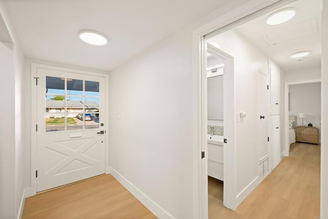 4158 Seri St, San Diego, CA 92117 - doorway to outside featuring light wood-style flooring and baseboards