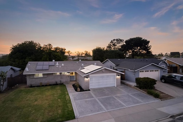 4158 Seri St, San Diego, CA 92117 - single story home featuring a garage, driveway, roof mounted solar panels, and stucco siding