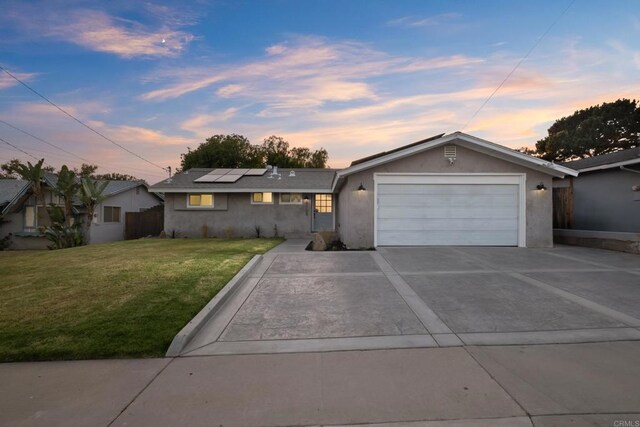 4158 Seri St, San Diego, CA 92117 - ranch-style home featuring a garage, concrete driveway, roof mounted solar panels, and stucco siding