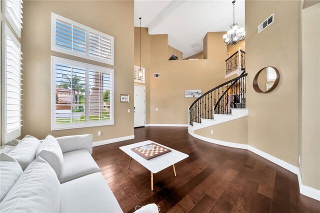 16139 Crooked Creek Ct, Chino Hills, CA 91709 - living room featuring a chandelier, stairway, high vaulted ceiling, baseboards, and hardwood / wood-style floors