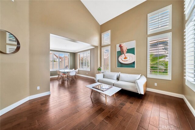 16139 Crooked Creek Ct, Chino Hills, CA 91709 - living room featuring high vaulted ceiling, baseboards, and wood-type flooring