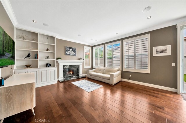 16139 Crooked Creek Ct, Chino Hills, CA 91709 - living area with ornamental molding, baseboards, dark wood finished floors, a fireplace, and recessed lighting