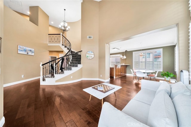 16139 Crooked Creek Ct, Chino Hills, CA 91709 - living area featuring a chandelier, baseboards, hardwood / wood-style floors, stairs, and a towering ceiling