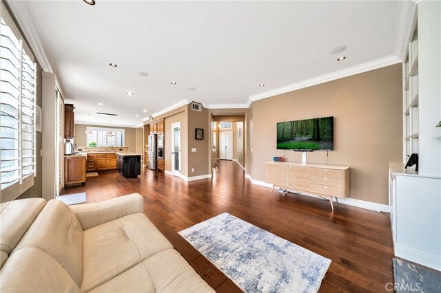 16139 Crooked Creek Ct, Chino Hills, CA 91709 - living room featuring dark wood finished floors, ornamental molding, recessed lighting, and baseboards