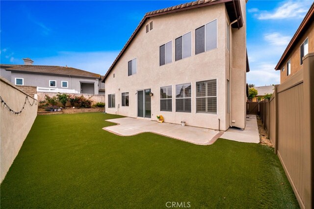 16139 Crooked Creek Ct, Chino Hills, CA 91709 - rear view of house featuring stucco siding and a patio