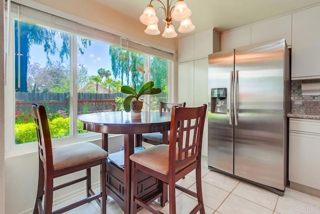 543 Boysenberry Way, Oceanside, CA 92057 - dining room featuring light tile patterned floors and a chandelier