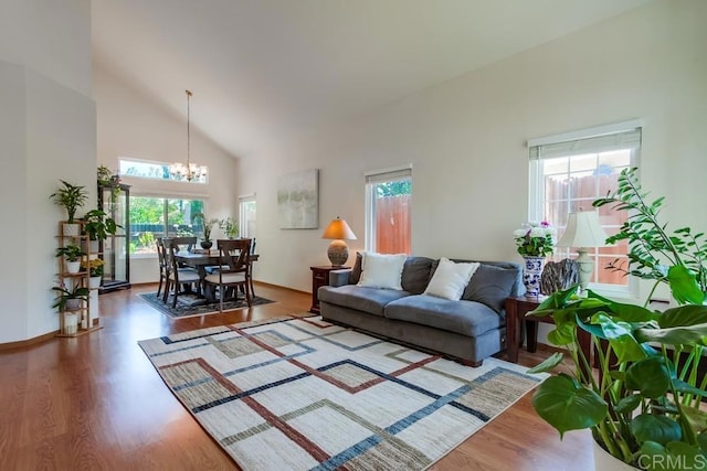 543 Boysenberry Way, Oceanside, CA 92057 - living room with a chandelier, wood finished floors, and high vaulted ceiling