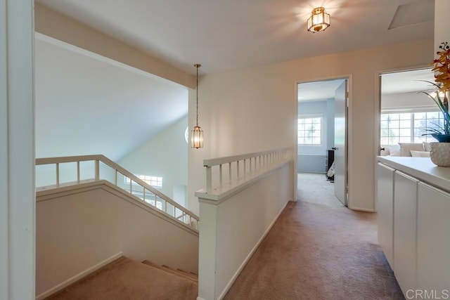 543 Boysenberry Way, Oceanside, CA 92057 - hallway featuring an upstairs landing, light carpet, and baseboards