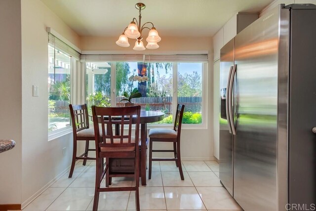 543 Boysenberry Way, Oceanside, CA 92057 - dining area with a chandelier, healthy amount of natural light, and light tile patterned floors