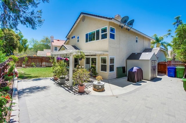 543 Boysenberry Way, Oceanside, CA 92057 - back of house with a pergola, a patio area, and a fenced backyard
