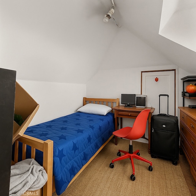 4415 Mettler St Unit 4413, Los Angeles, CA 90011 - carpeted bedroom featuring vaulted ceiling and a desk