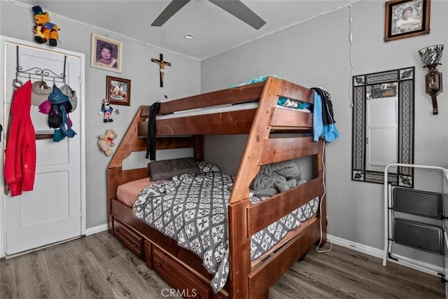 4415 Mettler St Unit 4413, Los Angeles, CA 90011 - bedroom with wood finished floors, baseboards, and ceiling fan