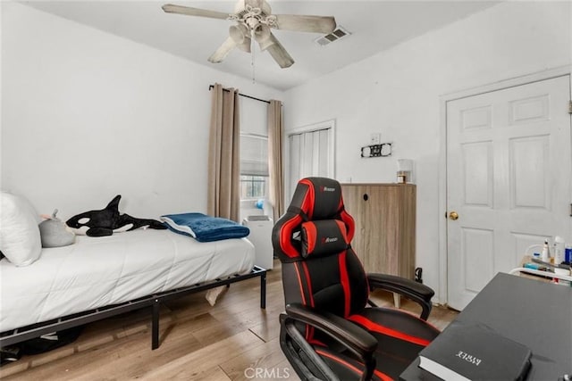 4415 Mettler St Unit 4413, Los Angeles, CA 90011 - bedroom with light wood-type flooring and ceiling fan