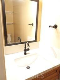 1725 Neil Armstrong St Unit 103, Montebello, CA 90640 - bathroom featuring vanity and a shower