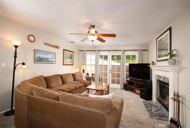 8630 Forsythe St, Sunland, CA 91040 - living room with carpet flooring, ceiling fan, and a high end fireplace