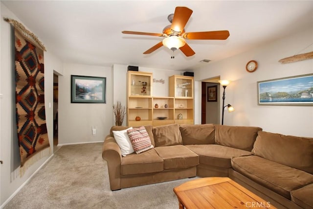 8630 Forsythe St, Sunland, CA 91040 - living room featuring light carpet, a ceiling fan, and baseboards