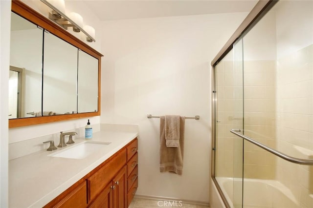 8630 Forsythe St, Sunland, CA 91040 - bathroom featuring vanity and shower / bath combination with glass door