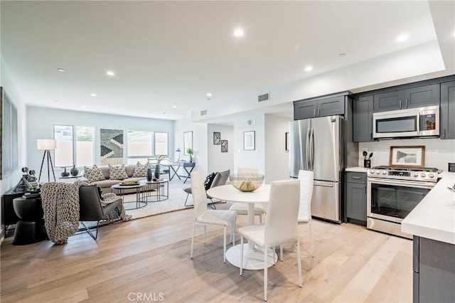 137 S Wilson Ave Unit 105, Pasadena, CA 91106 - dining room with light wood-style flooring and recessed lighting
