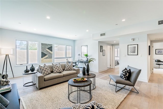 137 S Wilson Ave Unit 105, Pasadena, CA 91106 - living area with light wood-type flooring, baseboards, and recessed lighting