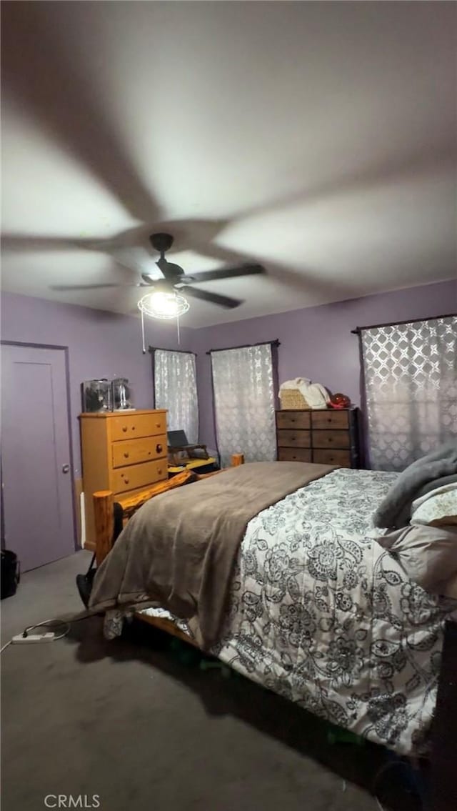 8758 S Hobart Blvd, Los Angeles, CA 90047 - bedroom featuring carpet floors and ceiling fan