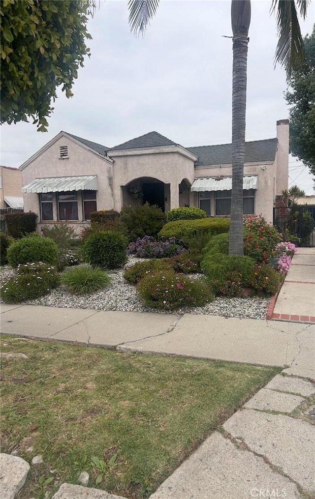 8758 S Hobart Blvd, Los Angeles, CA 90047 - view of front of property with stucco siding