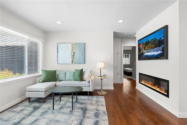 3409 W 175th St, Torrance, CA 90504 - living area with wood finished floors, baseboards, a glass covered fireplace, and recessed lighting