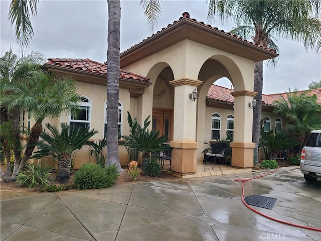 6116 Chadbourne Ave, Riverside, CA 92505 - view of front of property featuring a tile roof and stucco siding