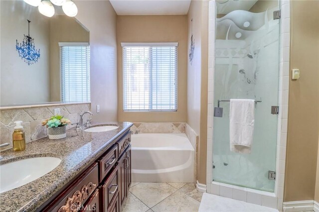 6116 Chadbourne Ave, Riverside, CA 92505 - bathroom with a stall shower, a garden tub, double vanity, and tile patterned floors