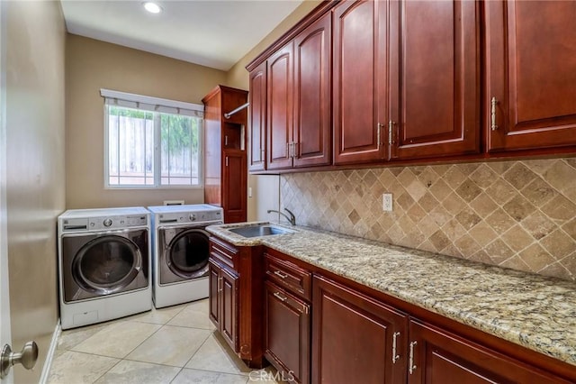 6116 Chadbourne Ave, Riverside, CA 92505 - laundry area with washer and clothes dryer, cabinet space, light tile patterned flooring, and recessed lighting