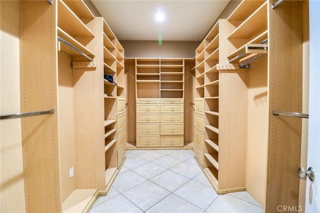 6116 Chadbourne Ave, Riverside, CA 92505 - walk in closet featuring light tile patterned floors