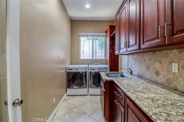 6116 Chadbourne Ave, Riverside, CA 92505 - washroom with cabinet space, separate washer and dryer, and light tile patterned flooring