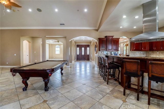 6116 Chadbourne Ave, Riverside, CA 92505 - game room featuring arched walkways, ornamental molding, light tile patterned floors, a ceiling fan, and pool table