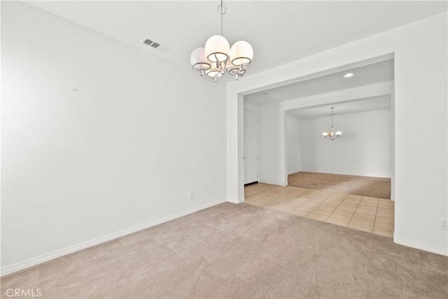 28538 Redwood Canyon Pl, Saugus, CA 91390 - tiled empty room with a chandelier, carpet flooring, and baseboards