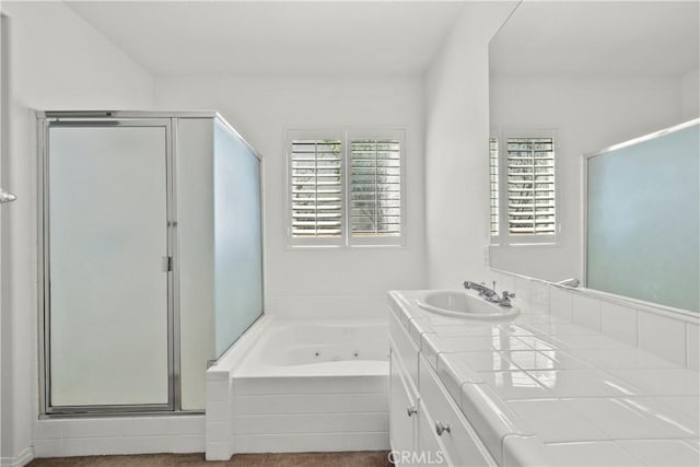 28538 Redwood Canyon Pl, Saugus, CA 91390 - bathroom featuring healthy amount of natural light, a stall shower, vanity, and a whirlpool tub