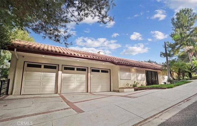 3300 Beaudry, Glendale, CA 91208 - mediterranean / spanish home with a tiled roof, stucco siding, concrete driveway, and a garage