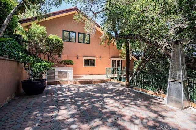 3300 Beaudry, Glendale, CA 91208 - rear view of house featuring stucco siding and a patio area