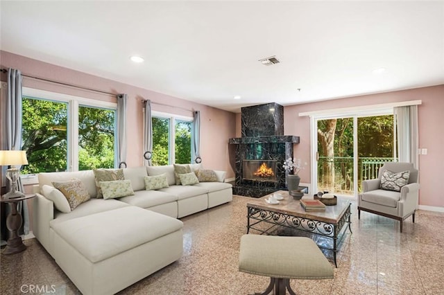 3300 Beaudry, Glendale, CA 91208 - living area featuring healthy amount of natural light, granite tiled floors, a fireplace, recessed lighting, and baseboards