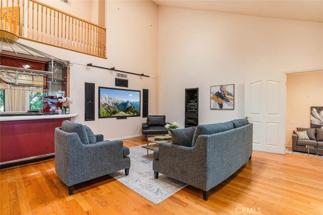 3300 Beaudry, Glendale, CA 91208 - living room featuring high vaulted ceiling and wood finished floors