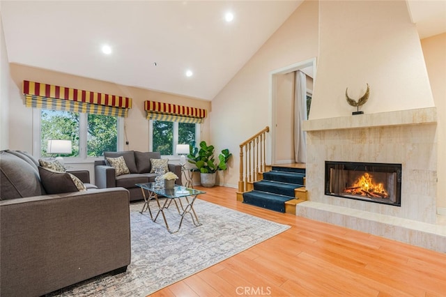 3300 Beaudry, Glendale, CA 91208 - living room with wood finished floors, a fireplace, high vaulted ceiling, stairs, and recessed lighting