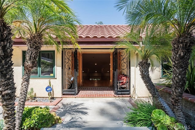 3300 Beaudry, Glendale, CA 91208 - doorway to property with stucco siding and a tiled roof