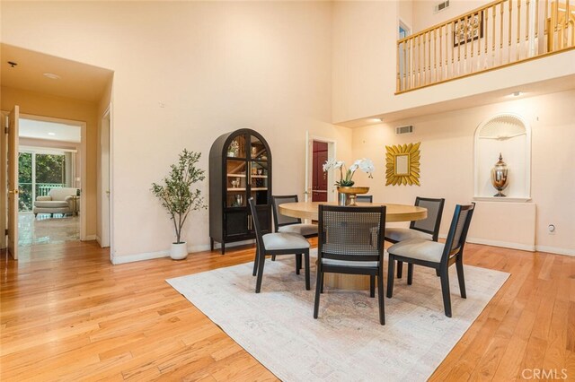 3300 Beaudry, Glendale, CA 91208 - dining room with light wood finished floors and a towering ceiling