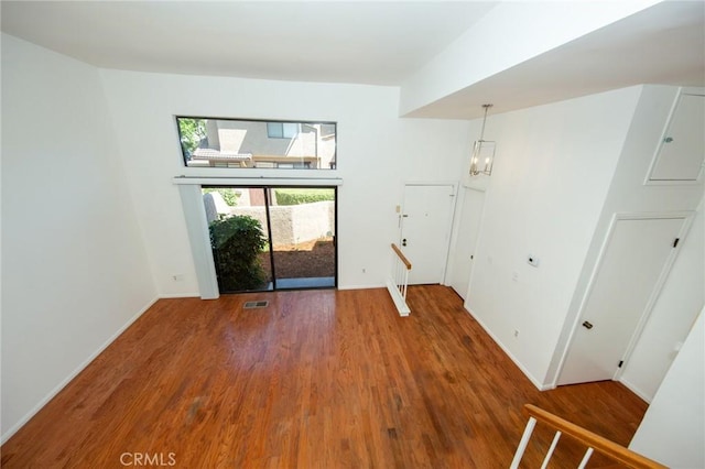 2440 Chandler Ave Unit 4, Simi Valley, CA 93065 - spare room featuring wood finished floors, baseboards, and a chandelier