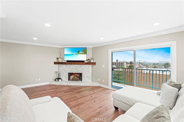 308 S Cabrillo Ave Unit 3, San Pedro, CA 90731 - living room featuring ornamental molding, baseboards, wood finished floors, recessed lighting, and a fireplace