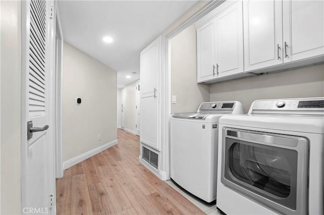 308 S Cabrillo Ave Unit 3, San Pedro, CA 90731 - laundry room with cabinet space, independent washer and dryer, light wood finished floors, recessed lighting, and baseboards