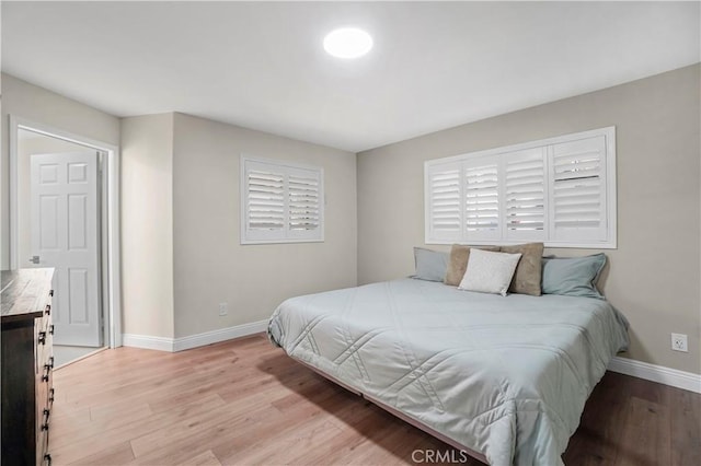 308 S Cabrillo Ave Unit 3, San Pedro, CA 90731 - bedroom featuring baseboards and light wood-style flooring