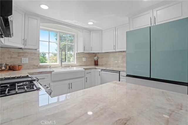 308 S Cabrillo Ave Unit 3, San Pedro, CA 90731 - kitchen with fridge, a sink, stainless steel dishwasher, white cabinets, and recessed lighting