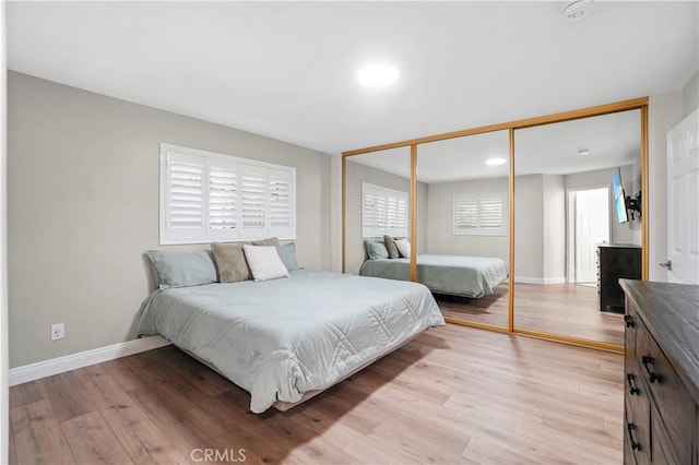 308 S Cabrillo Ave Unit 3, San Pedro, CA 90731 - bedroom with light wood finished floors, baseboards, a closet, and recessed lighting