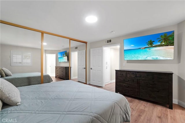 308 S Cabrillo Ave Unit 3, San Pedro, CA 90731 - bedroom featuring light wood-style floors, baseboards, and a closet