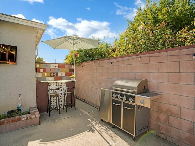 10404 Gaviota Ave, Granada Hills, CA 91344 - view of patio featuring grilling area