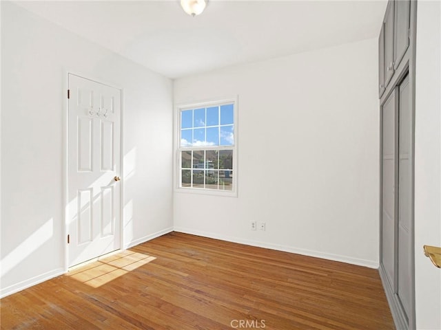 10404 Gaviota Ave, Granada Hills, CA 91344 - unfurnished bedroom featuring wood finished floors and a closet